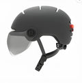 Cycling helmet with integrated LED brake and tail lights in two sizes