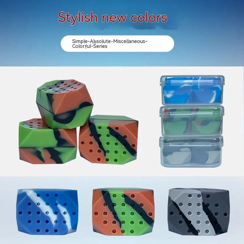 Transparent box containing two camouflage silicone facial muscle fitness balls for jaw exercise