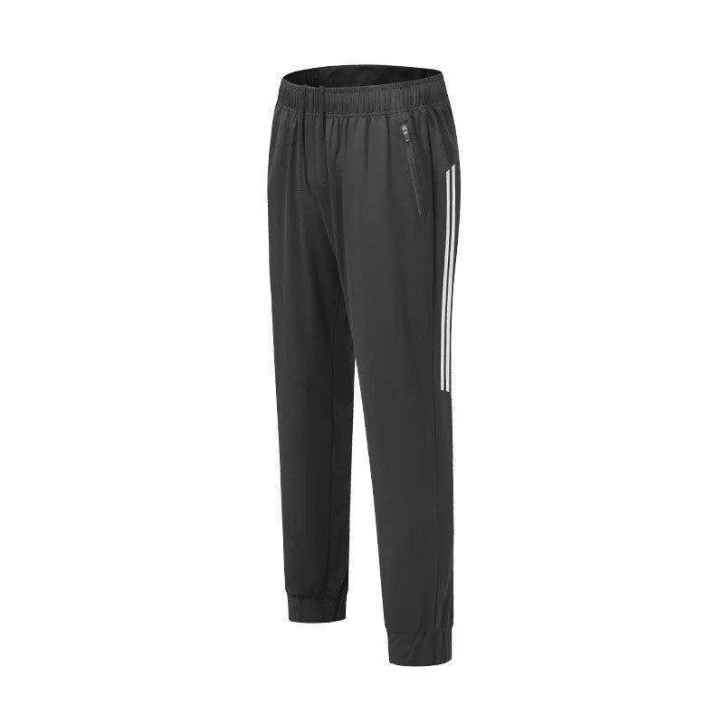 Men's black polyester running trousers with mid waist and full leg length for exercise.
