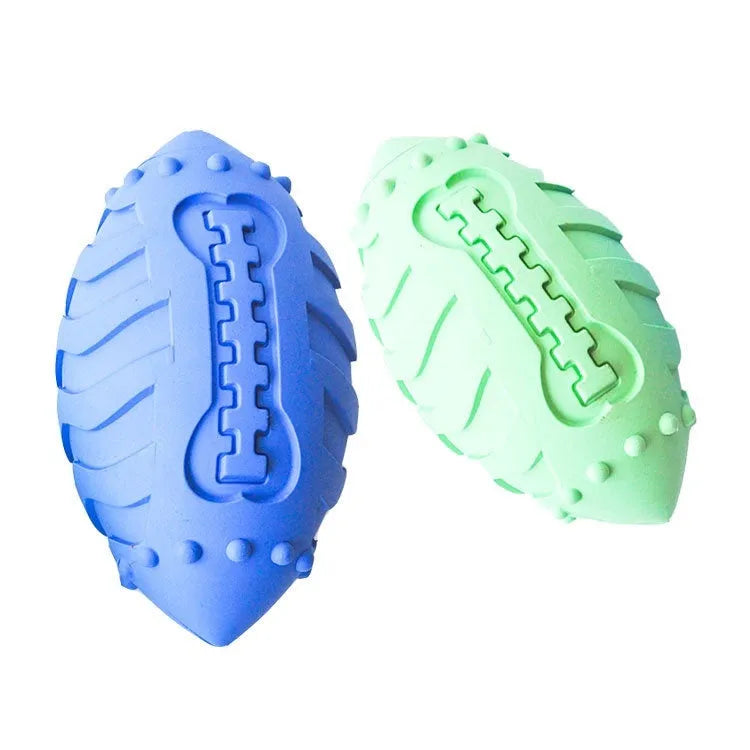 Light green thickened rubber rugby ball dog toy with textured surface for teeth cleaning.