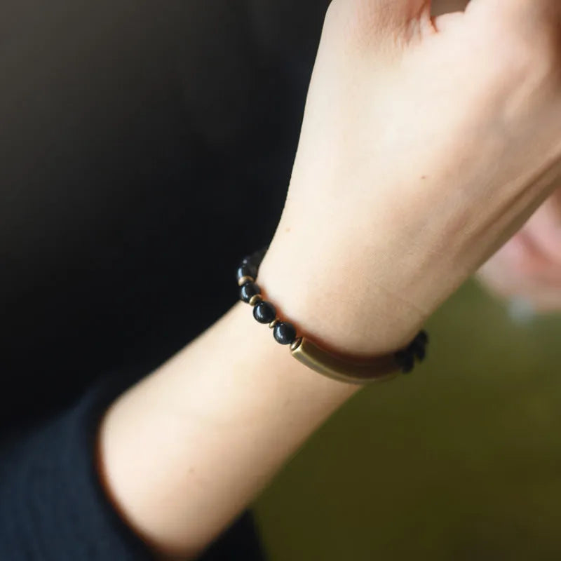 Layered ethnic bracelet with natural stone beads and brass fittings in adjustable sizing