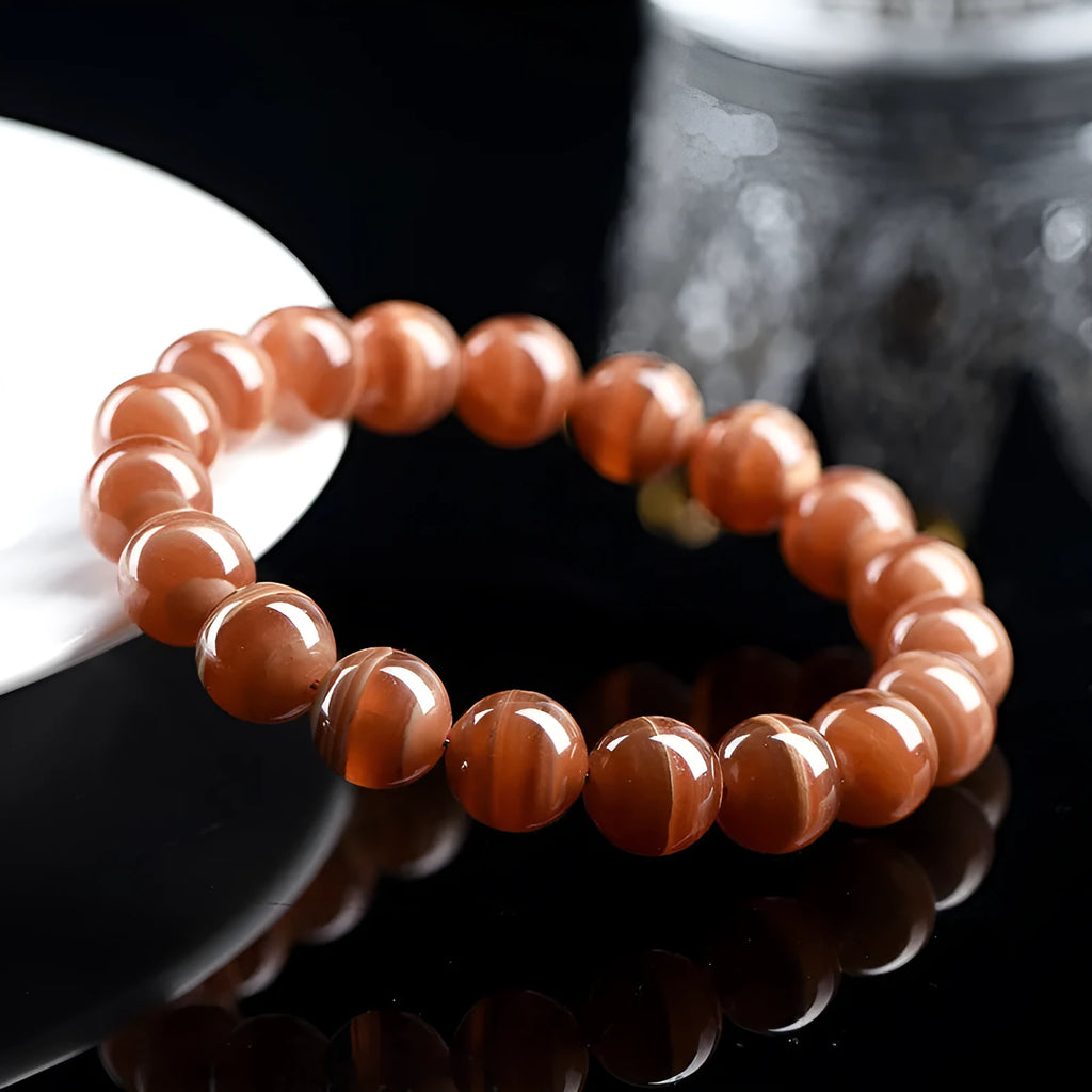Natural Old Mine Rhodochrosite round beads bracelet with geometric Ruyi design elements