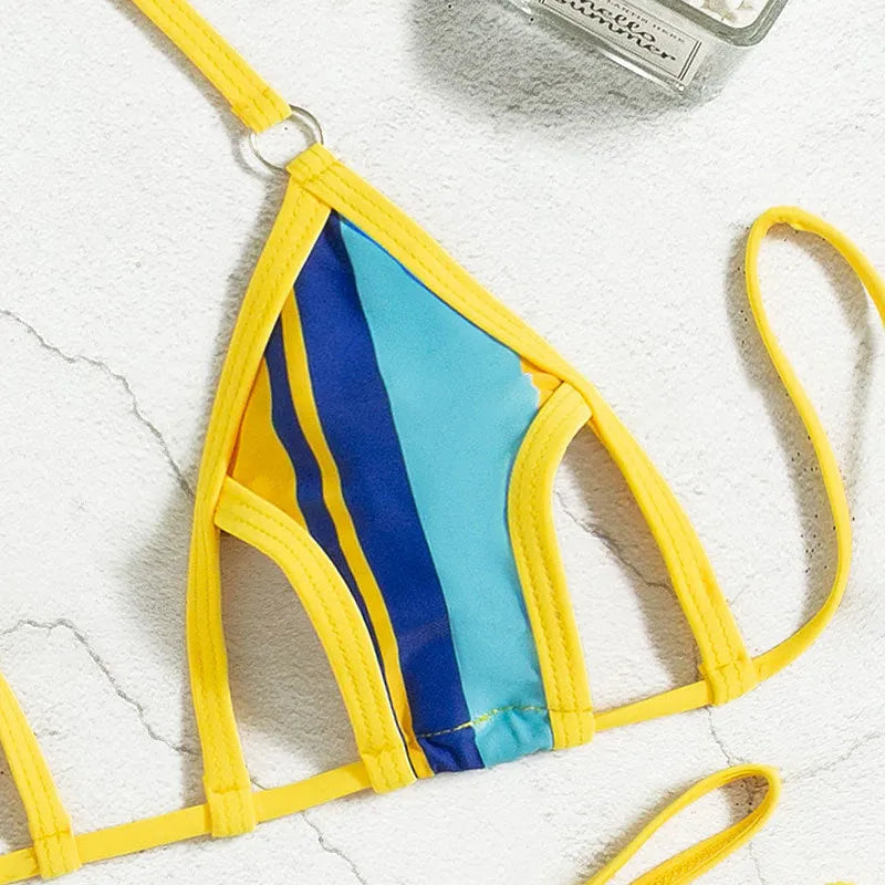 Yellow women's one-piece split swimsuit with neck-hanging style and high-waist backless design