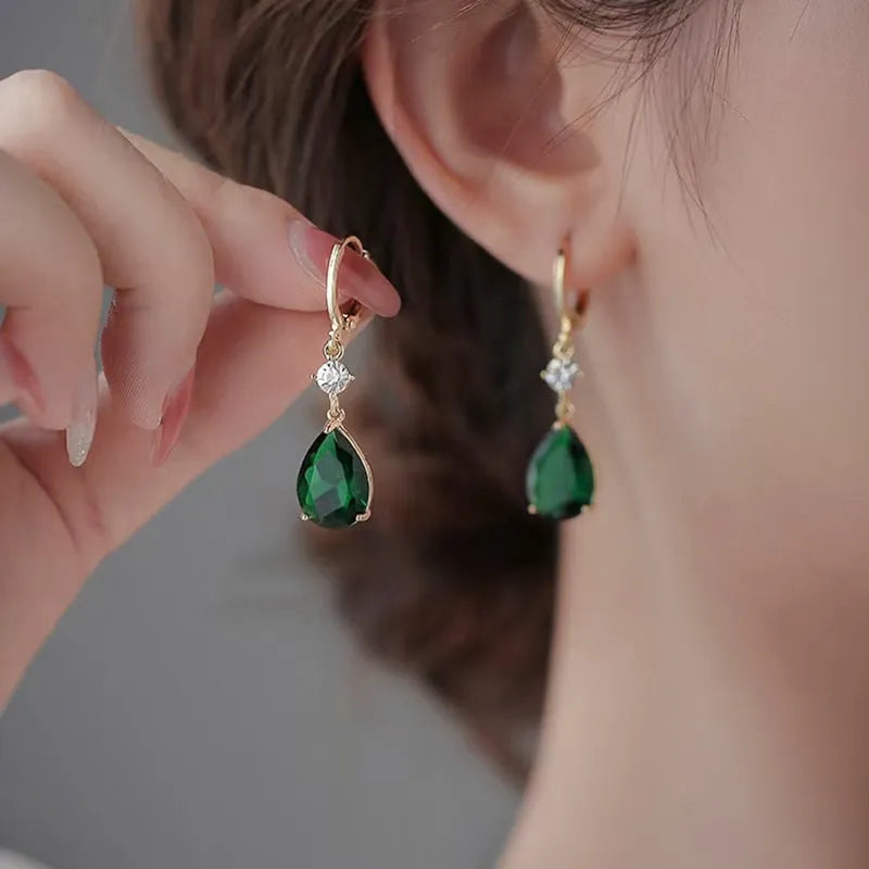 Green geometric teardrop alloy drop earrings for pierced ears.