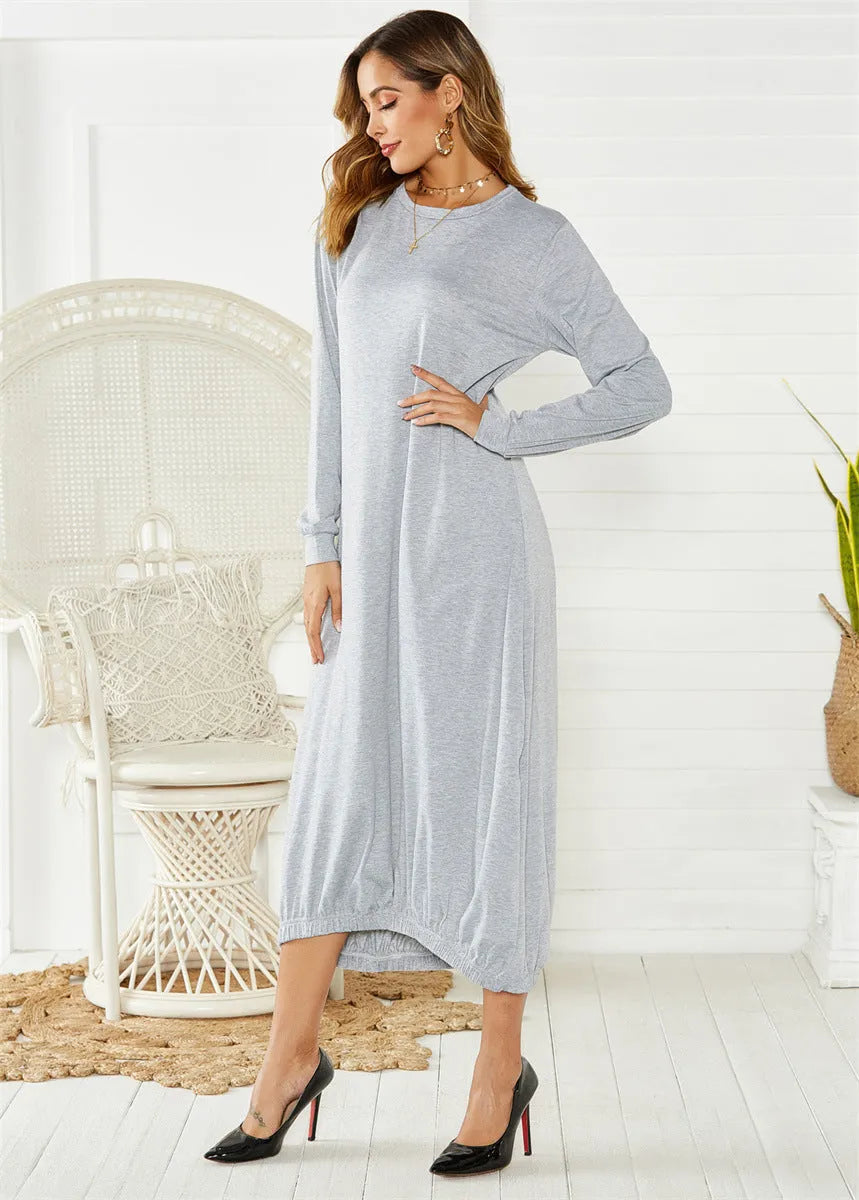 Women's black loose lantern dress with lace-up crew neck detail.