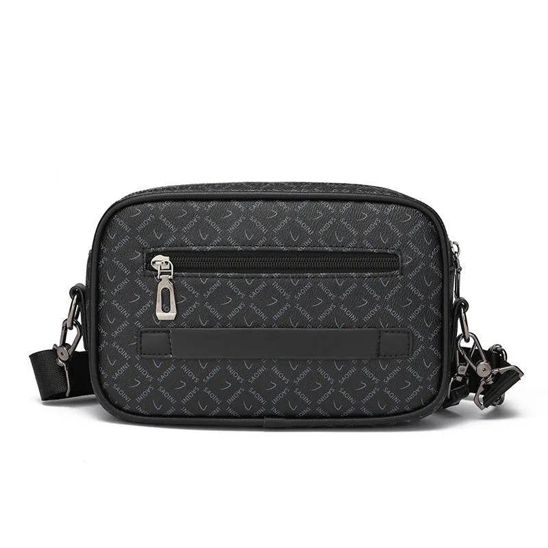 Men's black casual shoulder messenger bag with geometric pattern, shown with handheld top handle and adjustable shoulder strap.