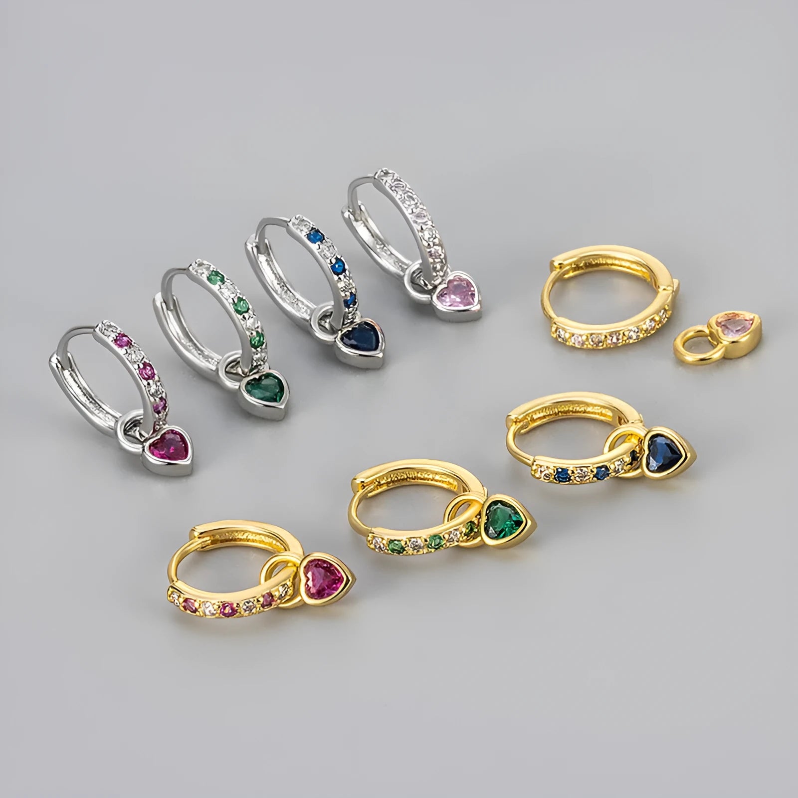 Women's heart-shaped drop earrings with colourful stones in gold or white gold coloured settings