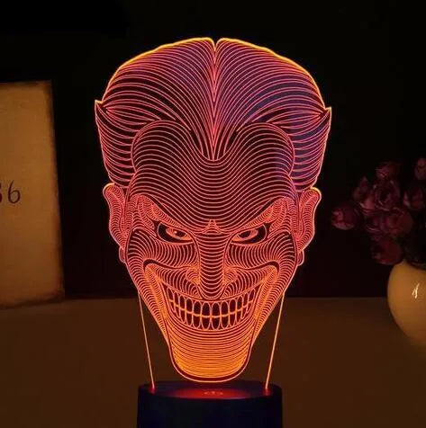 USB-powered 3D acrylic LED lamp showing multiple colour options on a desk