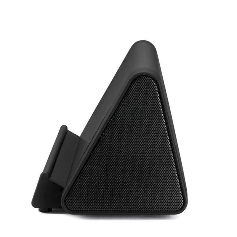 Wireless Bluetooth mini speaker in black or white with charging cable