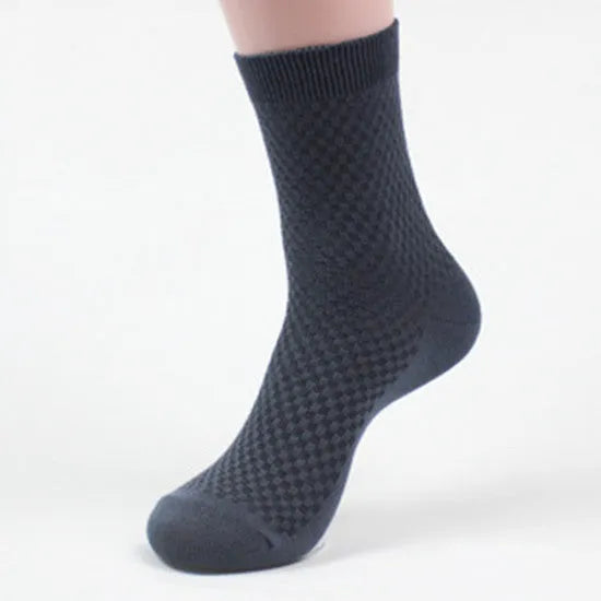 Men's bamboo fibre sock in small square pattern, shown in navy blue colour