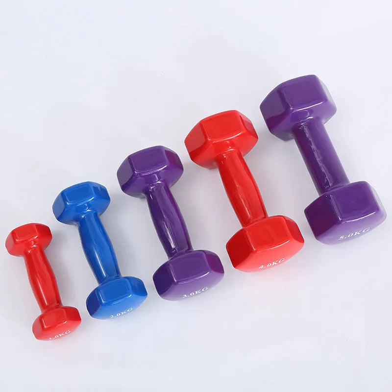 Bright colourful plastic-coated fitness dumbbells for home workouts and yoga exercises
