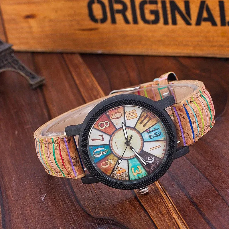 Women's vintage-style quartz watch with brown leather strap and silver round 37mm dial.