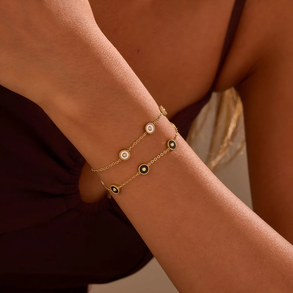 Women's stainless steel bracelet with electroplated 18K gold plating and geometric fritillary design