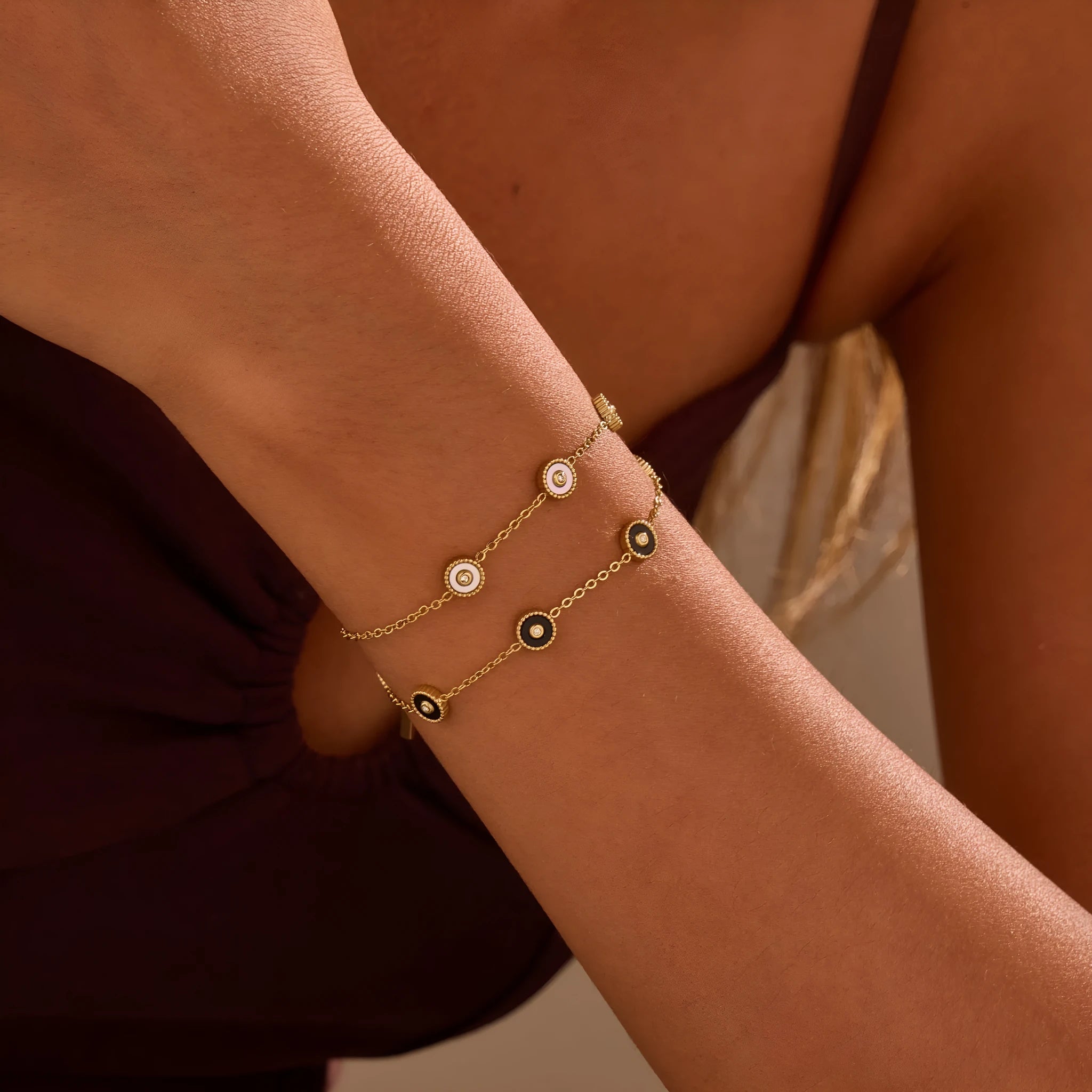 Women's stainless steel bracelet with electroplated 18K gold plating and geometric fritillary design