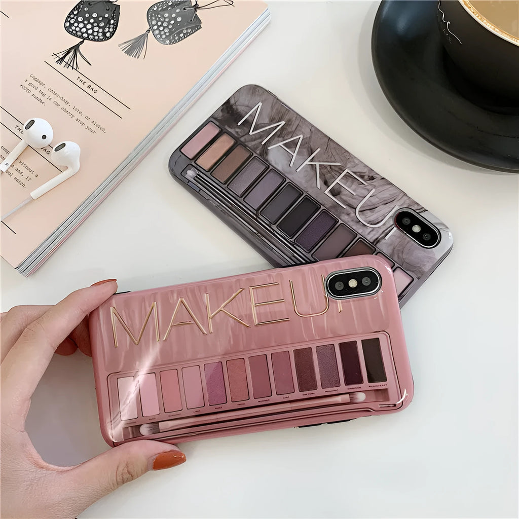 Flesh and grey silicone phone case for multiple iPhone models on a table.