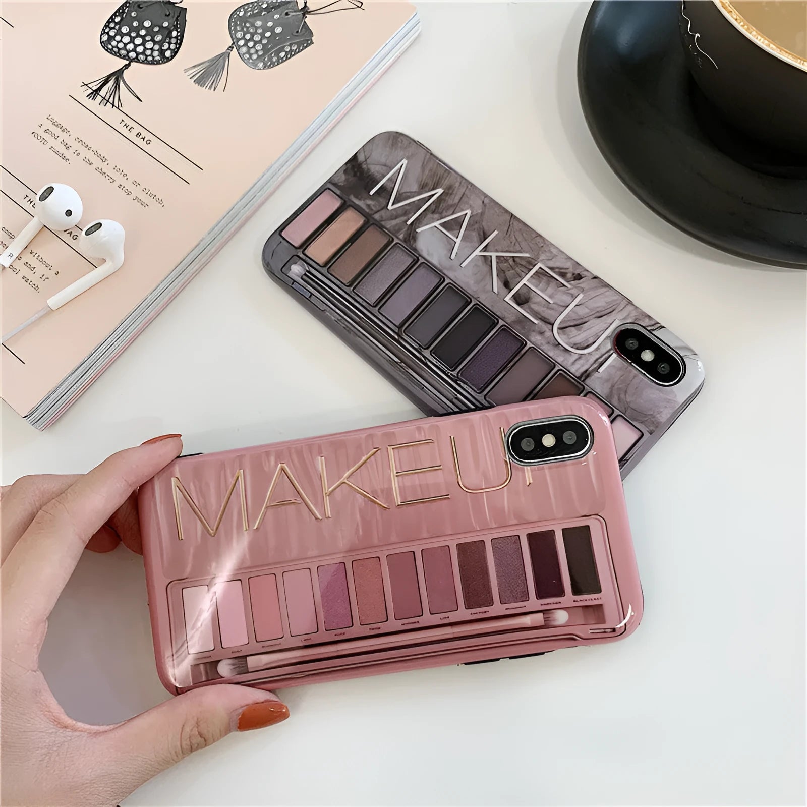 Flesh and grey silicone phone case for multiple iPhone models on a table.