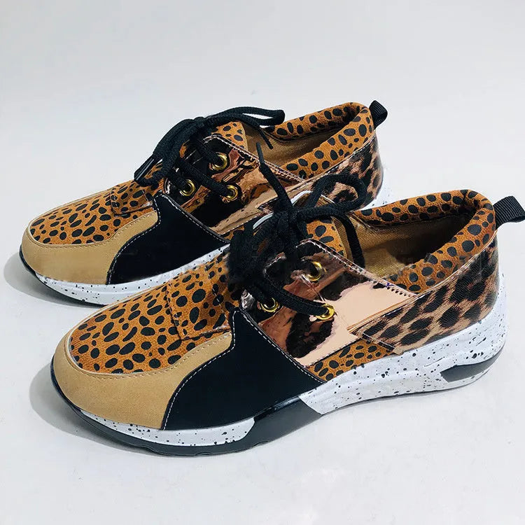 Women's wedge heel flat sneakers in breathable fabric showing round toe and slip-on design