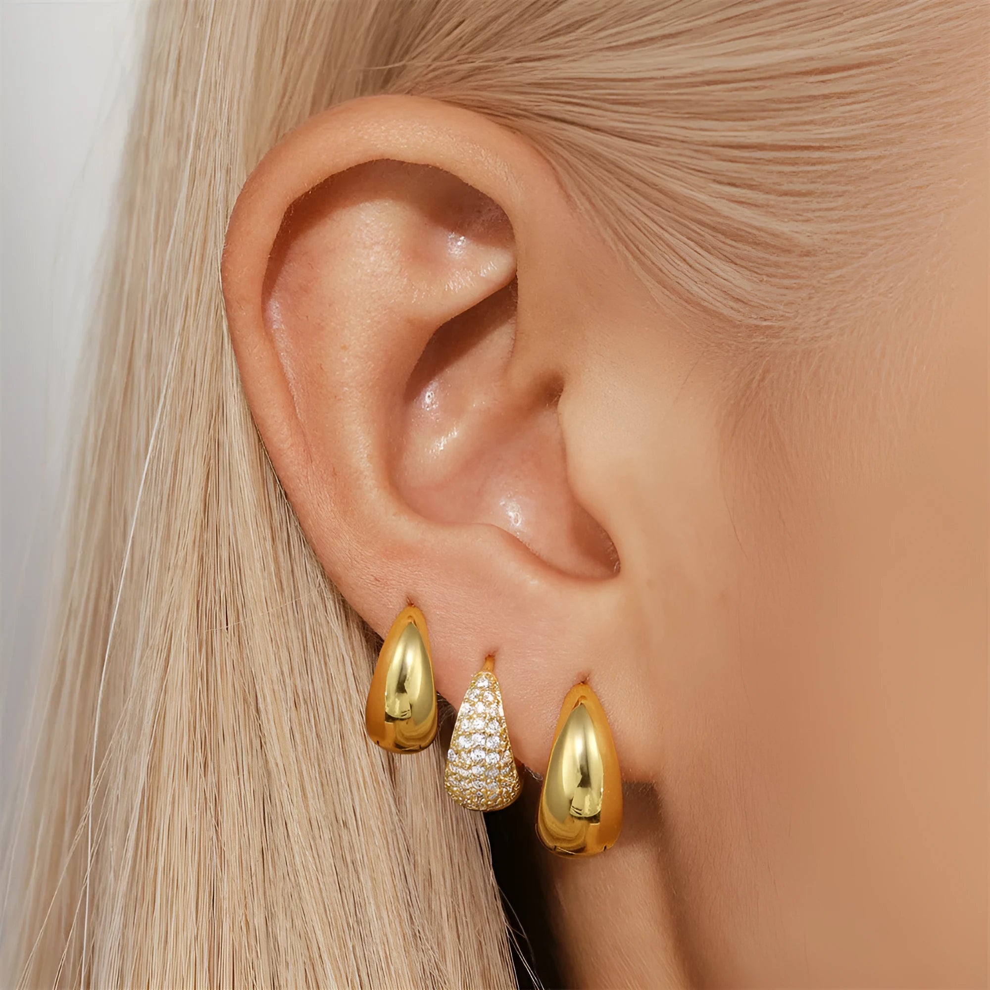 Brass diamond earclip earrings with electroplated golden finish and geometric design