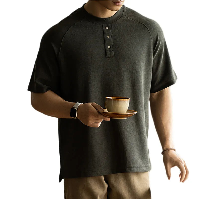 Women's casual gray pullover top with raglan sleeves and a terry texture fabric.