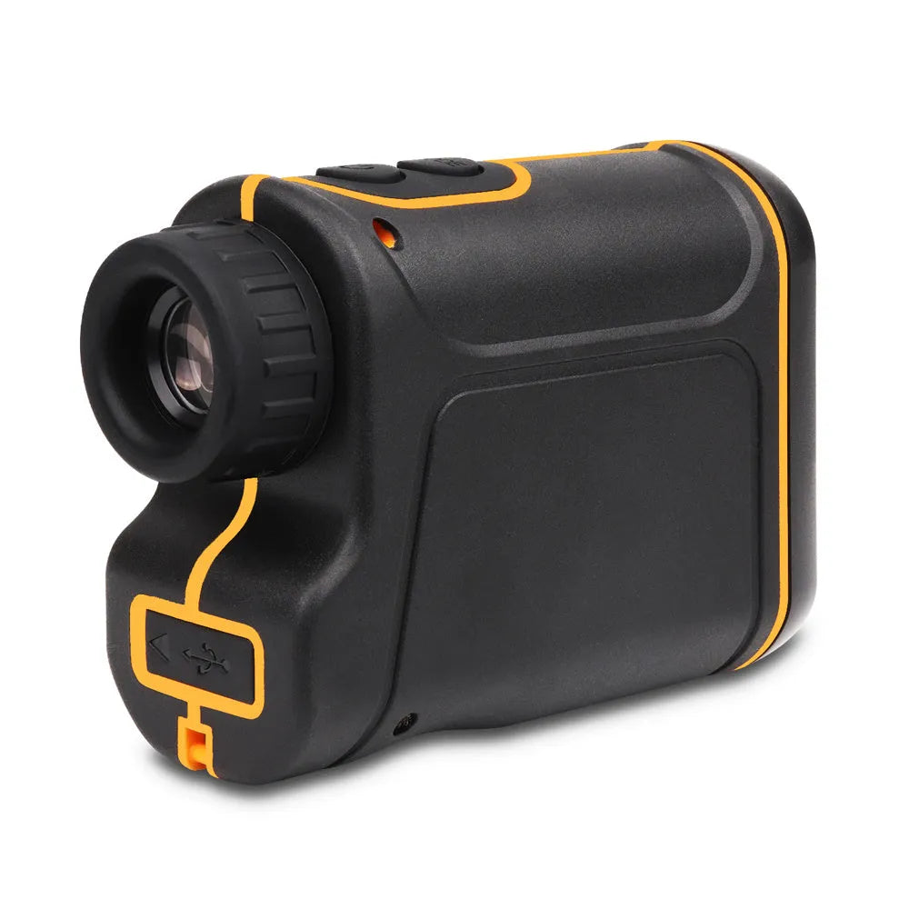 Black handheld golf laser rangefinder on a green.