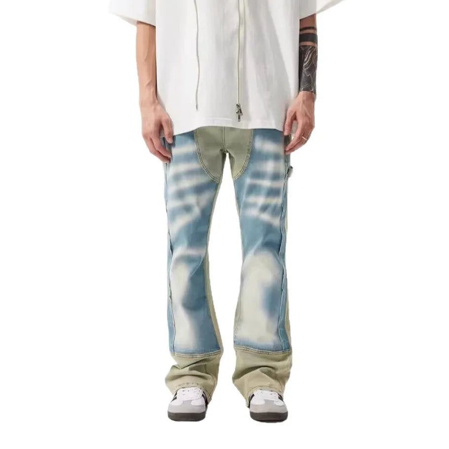 Yellow and blue retro patchwork splash-ink damaged design jeans with mid-waist fit and zip fly