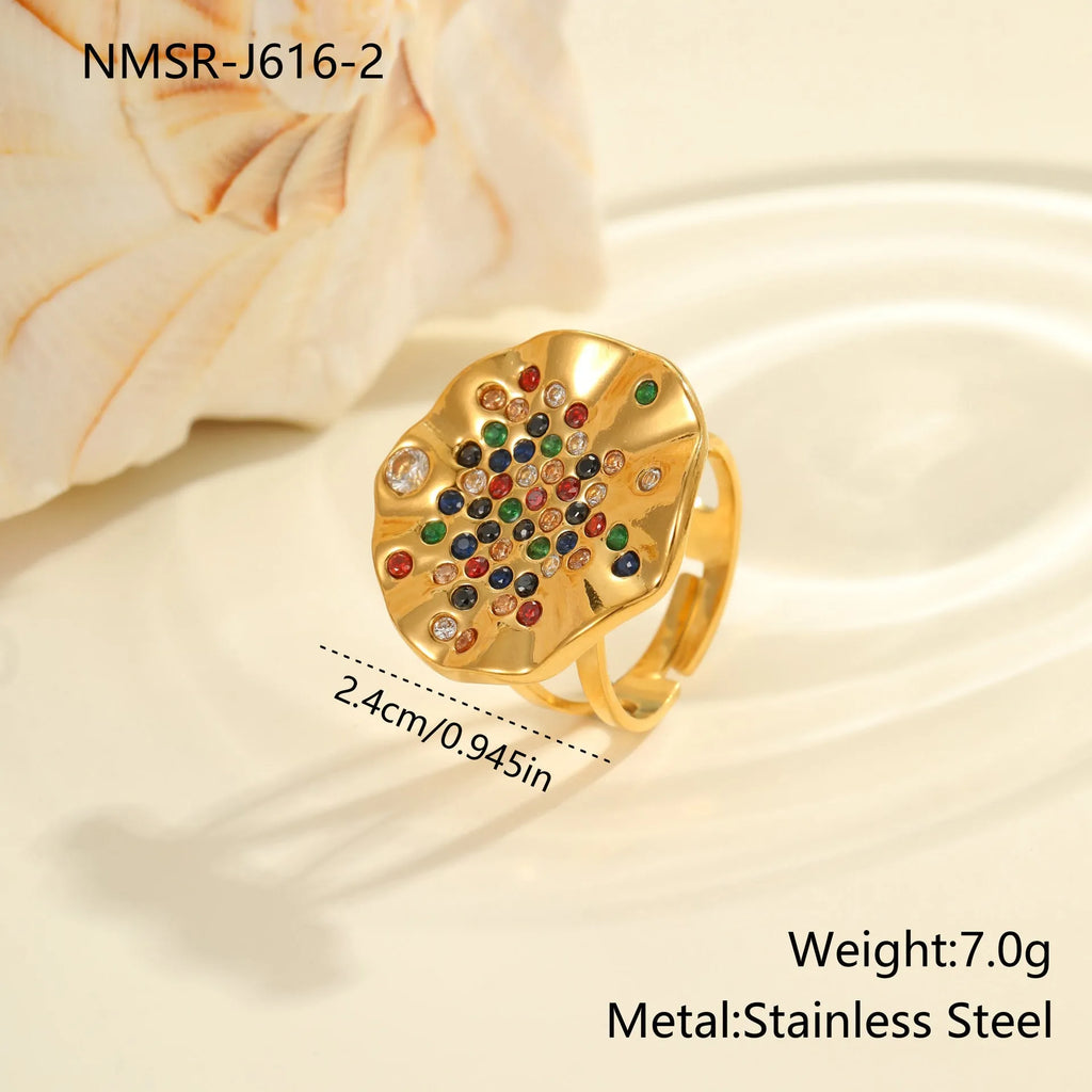 Open mouth geometry ring with colourful crystal inlays and electroplated titanium steel finish