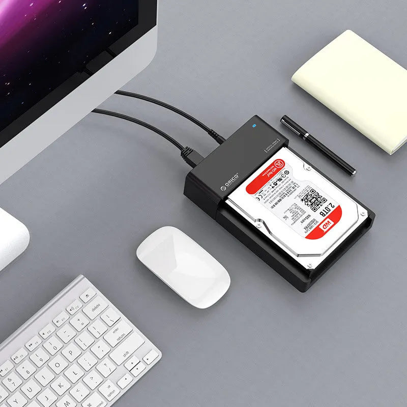 Black 2.5 inch SATA hard drive enclosure with USB cable for external storage conversion