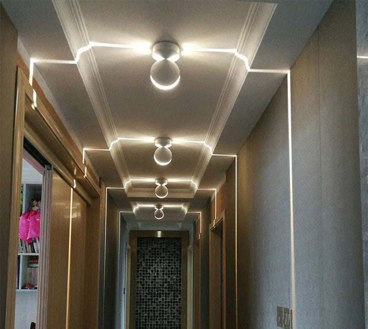 Modern aluminium bar-style wall spotlight with glass lens for multi-colour LED accent lighting.