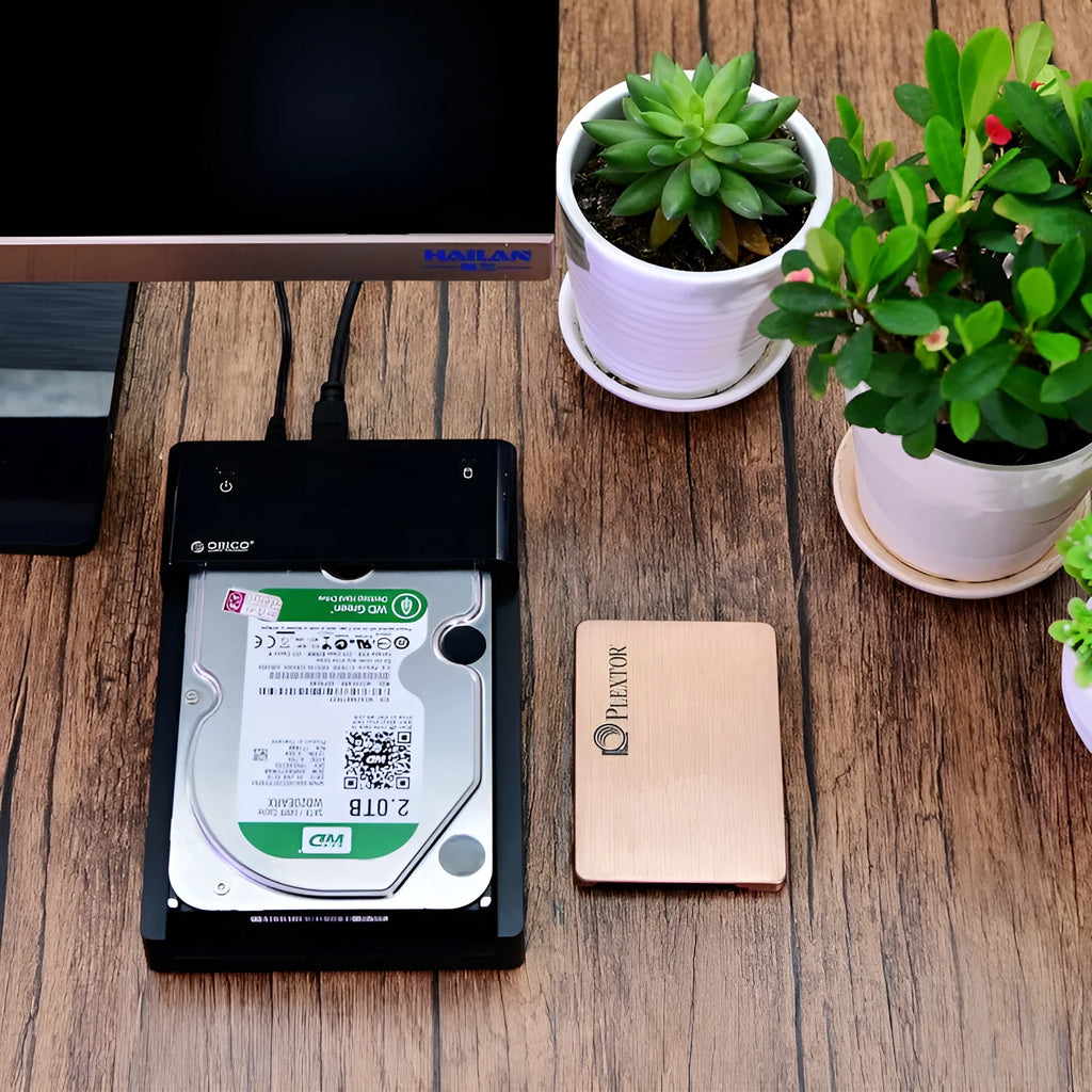 Black 2.5 inch SATA hard drive enclosure with USB cable for external storage conversion