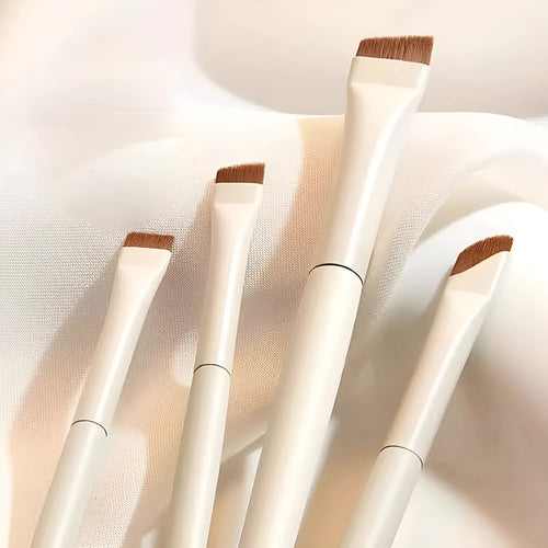 Four angled eyeliner and brow brushes with ultra-thin tips in leather case
