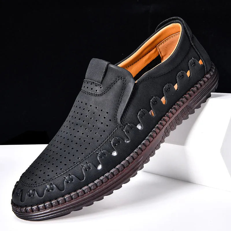 Men's brown slip-on casual leather shoes with round toe and flat PVC sole on a white background.