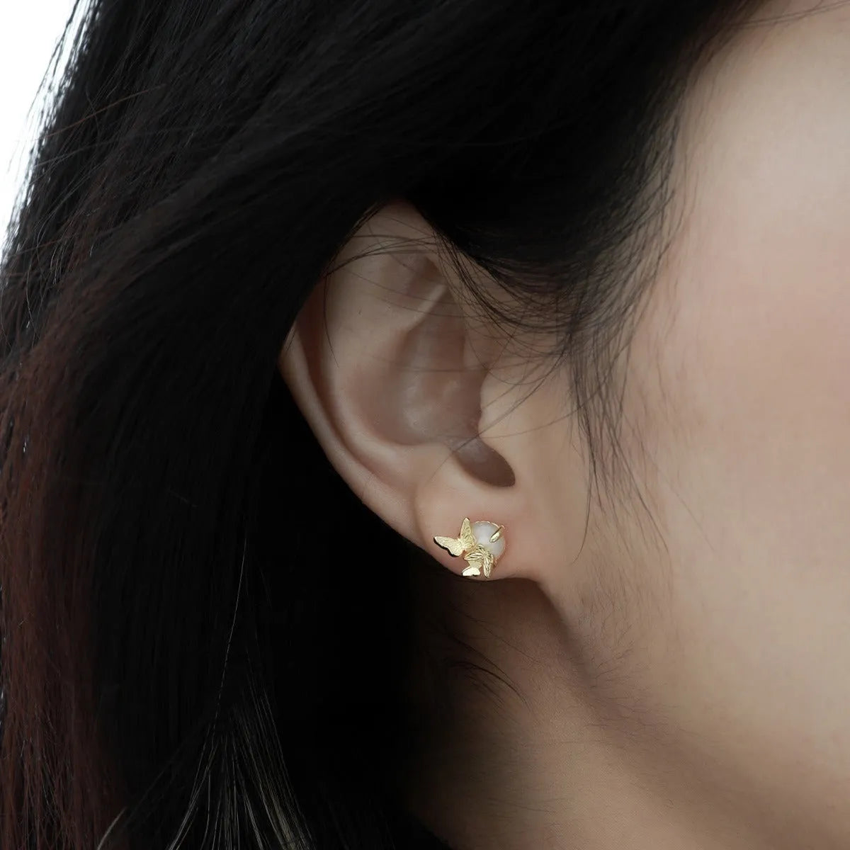 Butterfly-themed sterling silver ear studs with electroplated gold or white gold finish