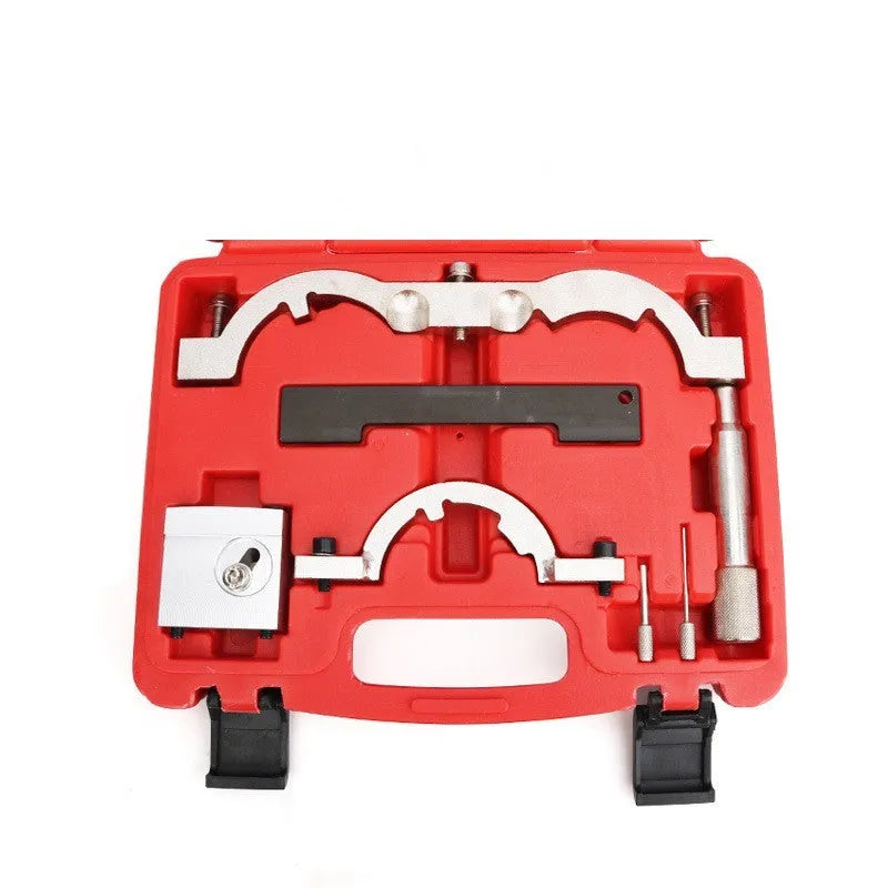 Red chrome-vanadium steel timing tool kit for Opel 1.4 LUJ engine on a workshop bench.