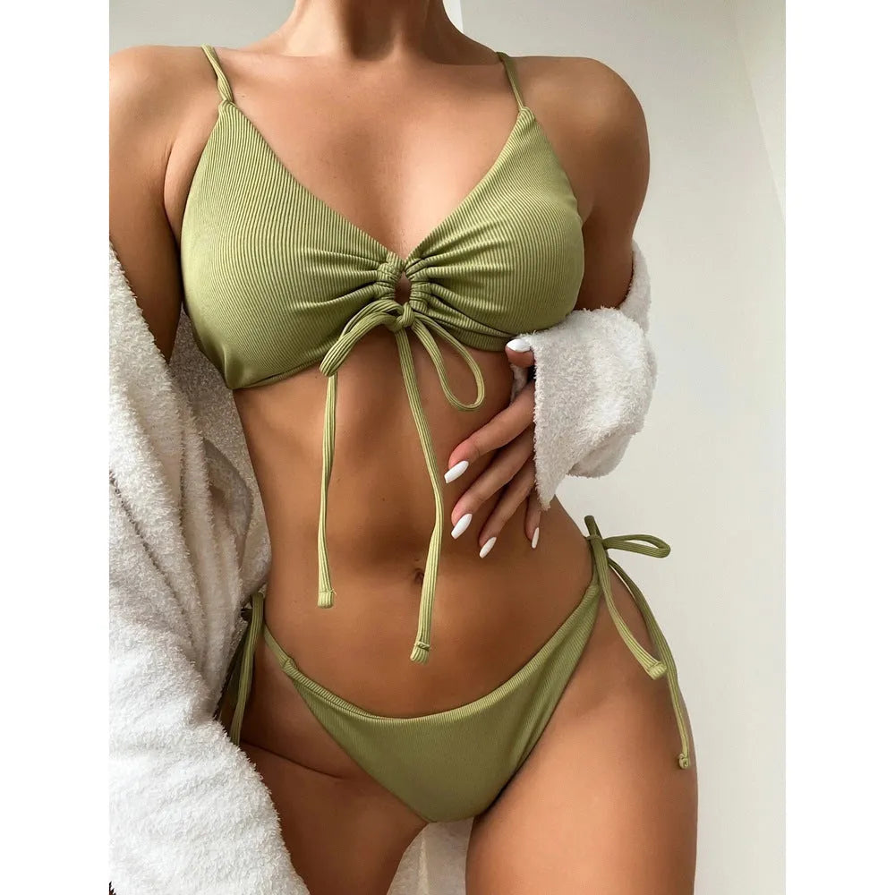 Women's solid colour drawstring triangle bikini top and high-leg briefs swimsuit set.