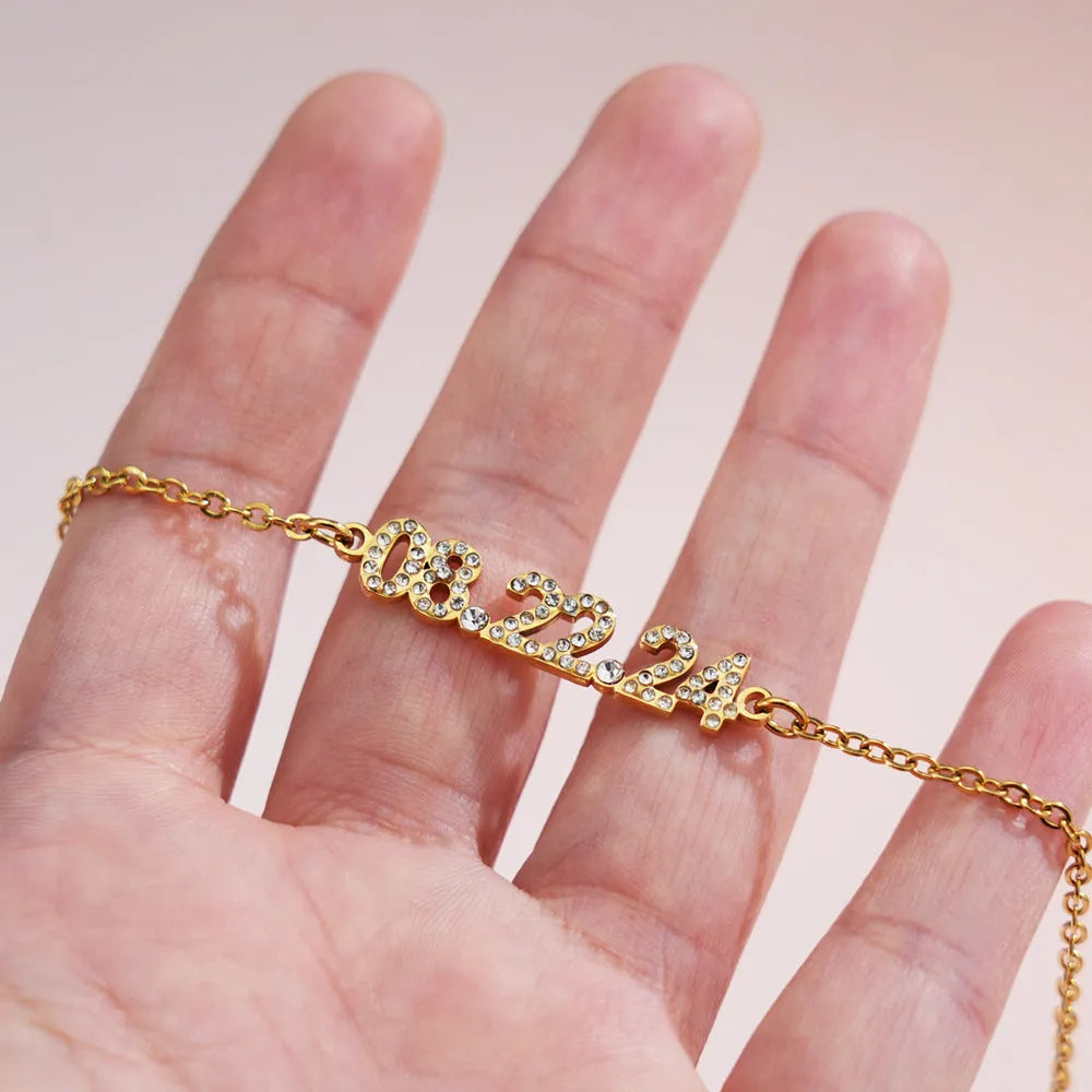 Stainless steel bracelet with diamond-set digital numbers display in rose gold colour