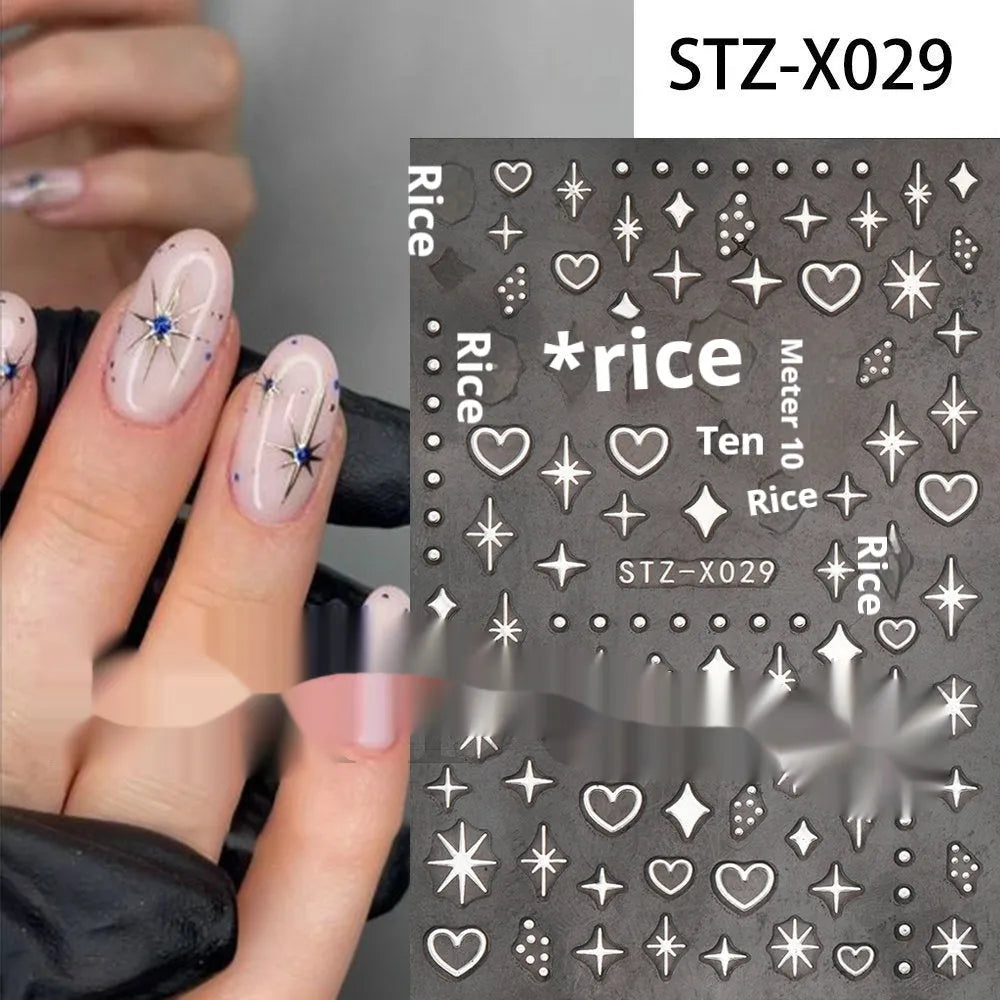 Set of 60 black and silver cartoon pattern nail strip stickers with plastic application patch.