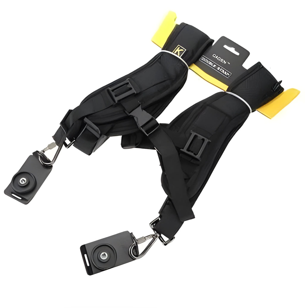 Black professional dual SLR camera shoulder strap with thick padding and metal hardware.