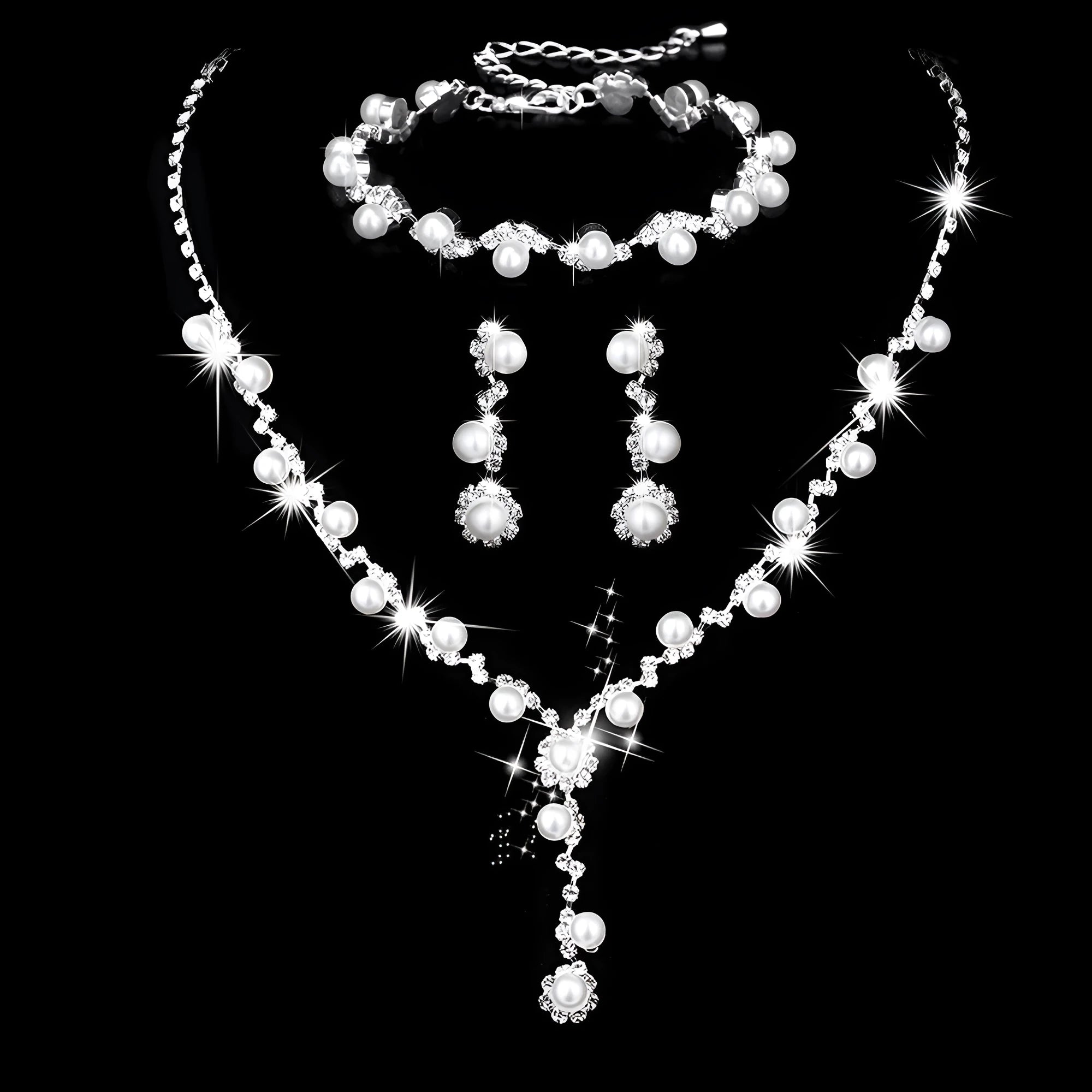 Fashion crystal rhinestone jewellery set including necklace earrings bracelet with pearl elements and bamboo chain design