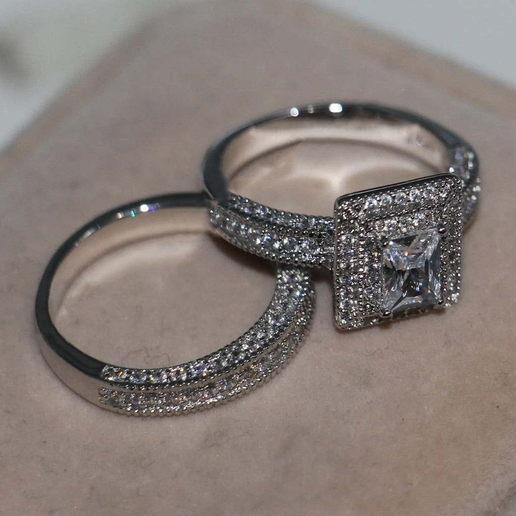 Silver zinc alloy double layer zircon ring on finger showing stacked design