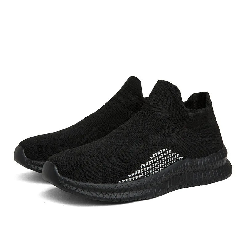 Flyknit fabric casual sneaker in solid colour with low-top and round toe.