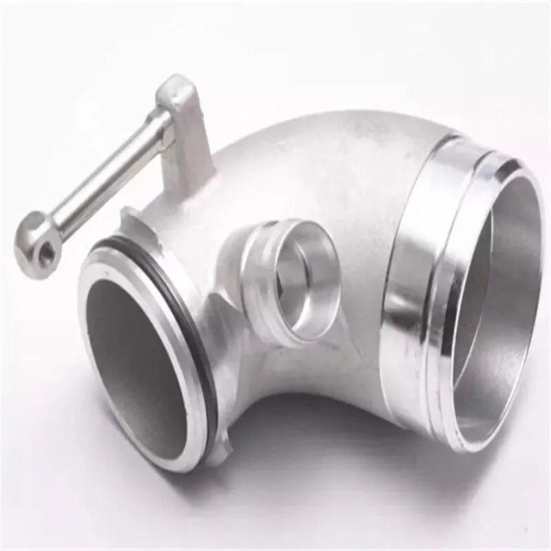 Black aluminium alloy 90 degree turbocharger elbow tube for lateral engine mounting.