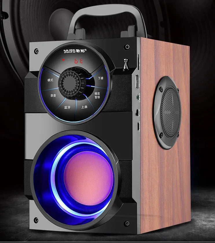 Black portable mini home audio system with subwoofer, connection cable, and charging accessories