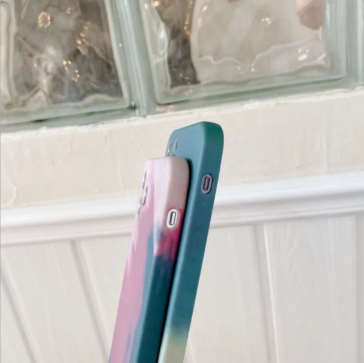 Soft silicone iPhone case with gradient abstract geometry pattern in blue, green, pink or purple colour options