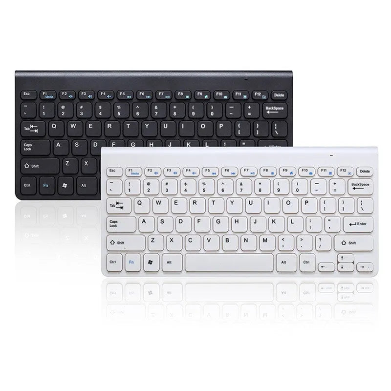 Black wireless keyboard and mouse set on wooden desk showing 2.4GHz wireless operation
