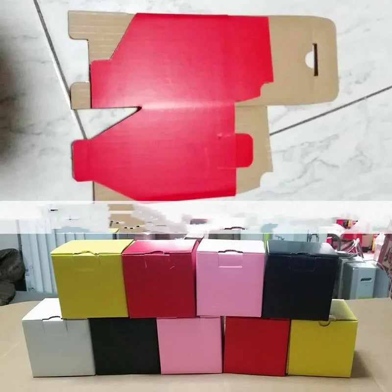 Square corrugated cardboard packaging box in black, shown in sizes 8cm, 10cm, and 15cm.