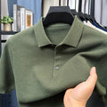 Men's loose fit short sleeve cotton pullover sweater in grey, shown on a model.