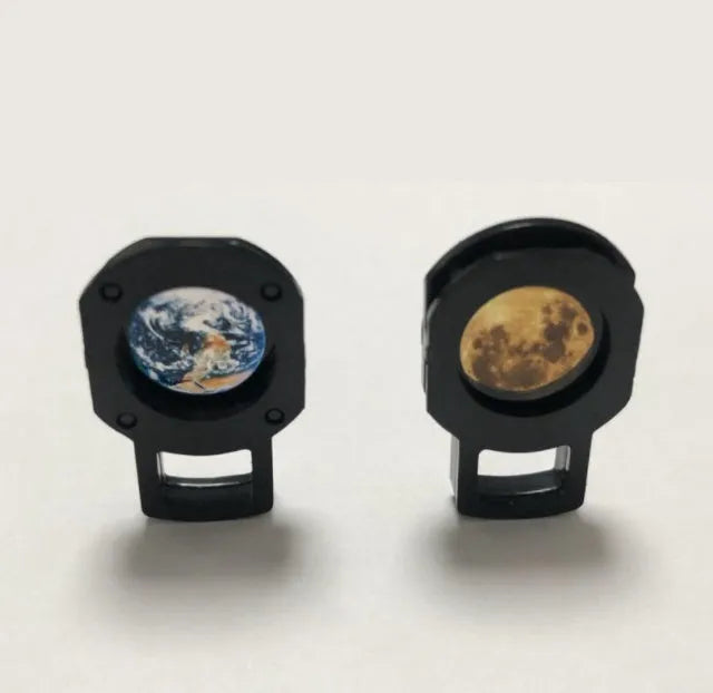White ABS plastic star projector lamp with adjustable hose bracket showing earth and moon projection chips.
