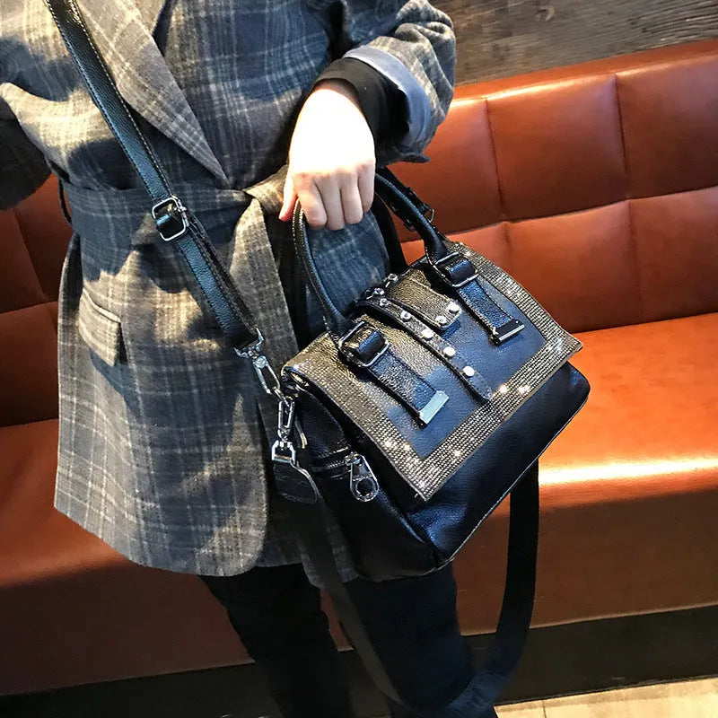 Large soft cowhide leather handbag in black with diamond decoration and lid closure