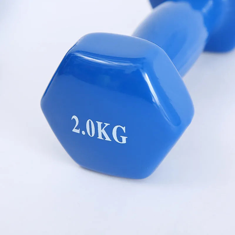 Bright colourful plastic-coated fitness dumbbells for home workouts and yoga exercises