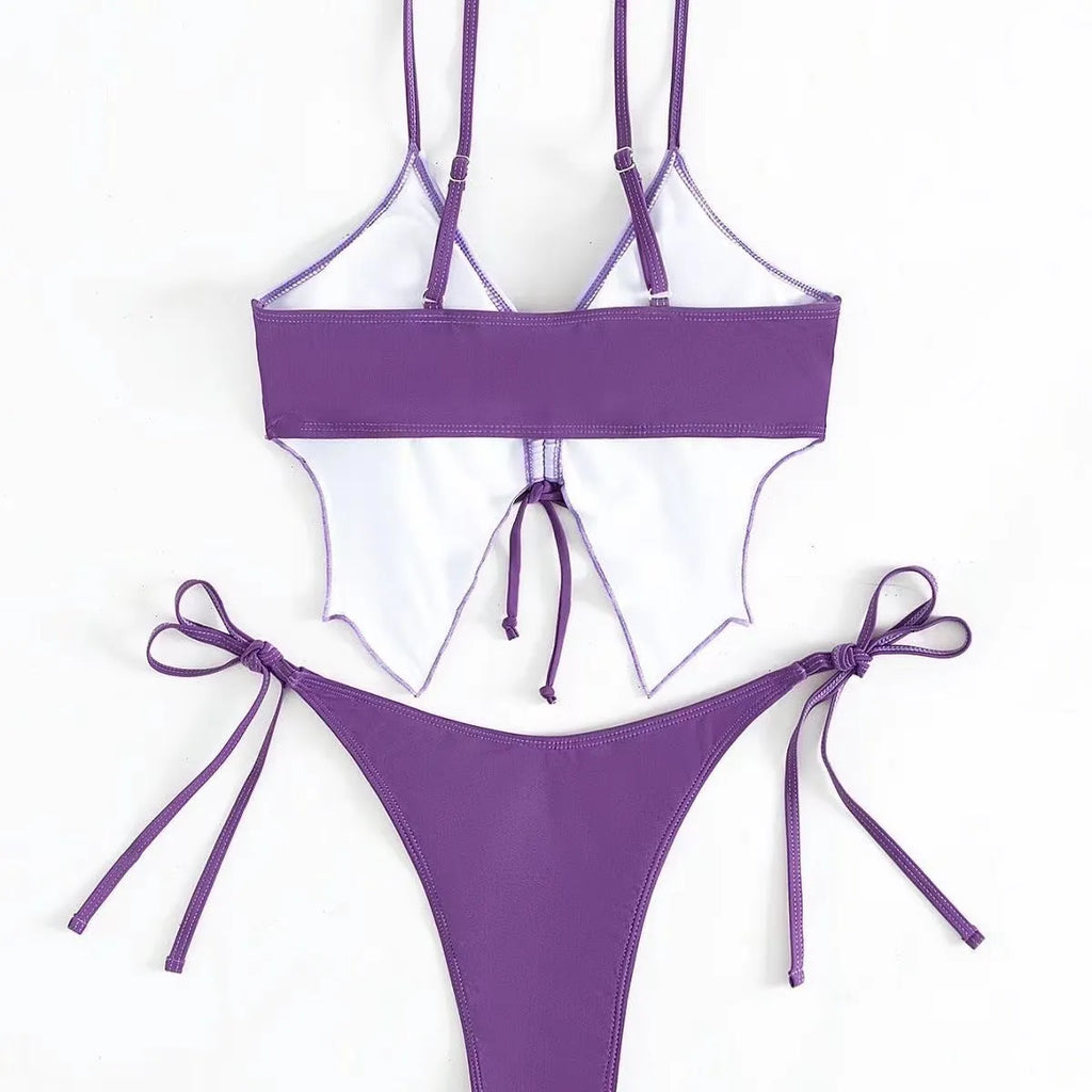 Women's sleeveless split bikini suit with bow detail in polyester fabric available in multiple colours